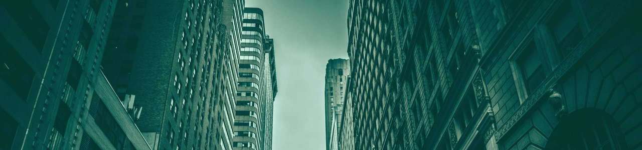 Modern office buildings where Apalala deploys its security technology